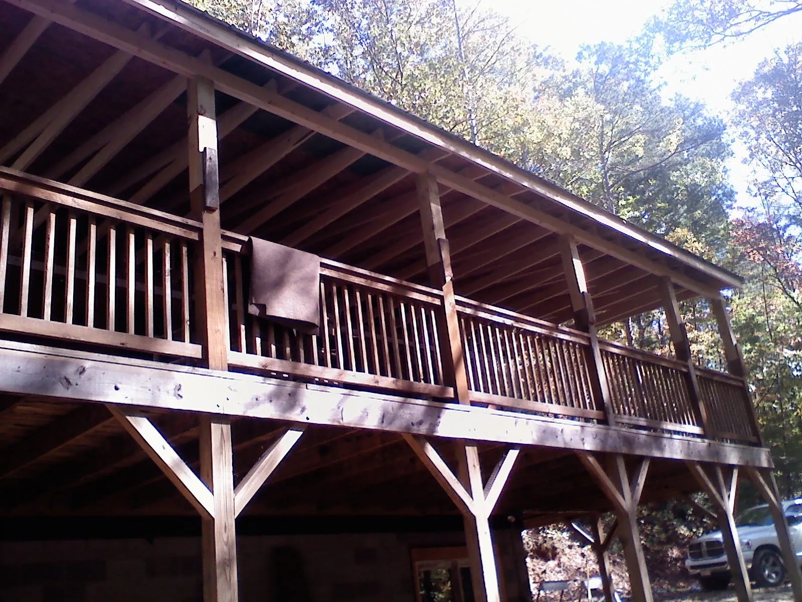 Timber framing under a new elevated porch and deck — Roof Leak Repair in Virden by Roofing Brothers